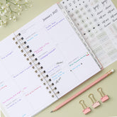 2027 weekly spread features ample lined writing space for to do lists, notes section, reference calendars, bullet points, and monthly tabs