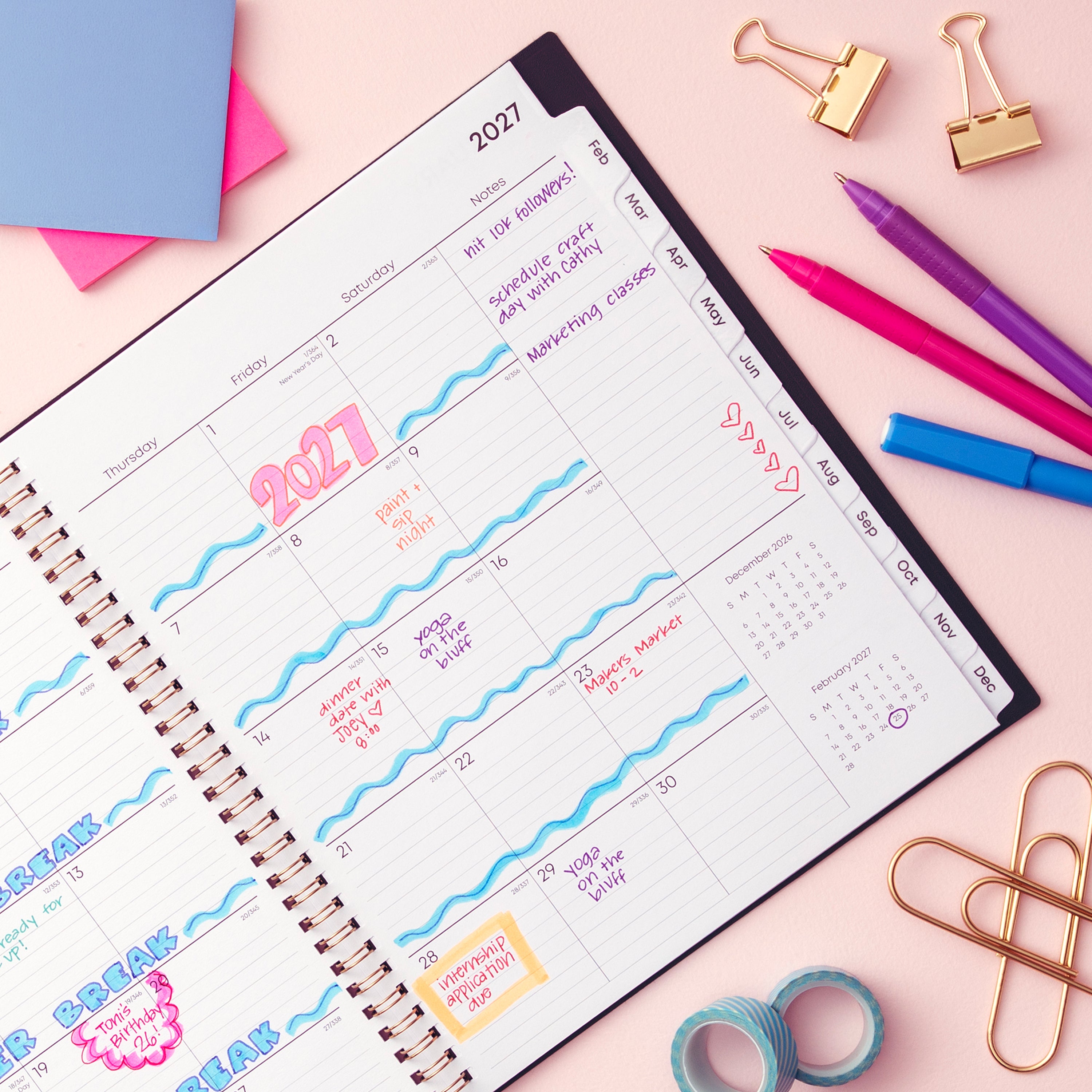 2027 weekly spread features ample lined writing space for to do lists, notes section, reference calendars, bullet points, and monthly tabs