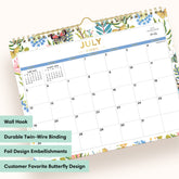 Calendar with floral design and July 2026 text, featuring wall hook, durable binding, and foil embellishments.