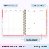 Planner with weekly spread design, dot grid, and lined sections on a white background. and multi colored tabs for planning