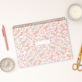 12 x 9 planning pad featuring a floral pink, orange floral front cover with twin wire-o binding