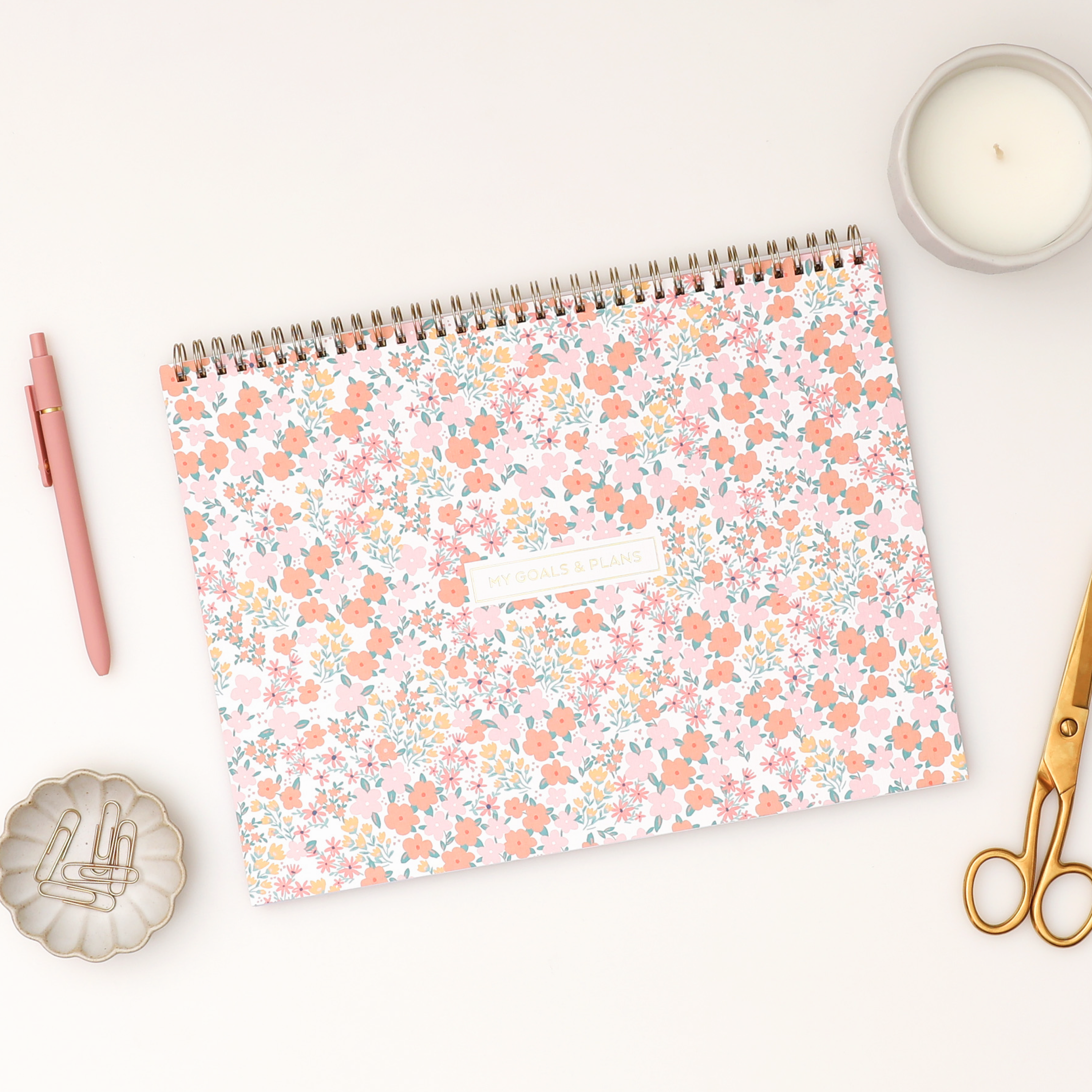 12 x 9 planning pad featuring a floral pink, orange floral front cover with twin wire-o binding