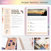 Open planner showing monthly content with a sunset silhouette on a mountain, surrounded by smaller images of the planner&