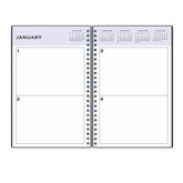 Open spiral-bound planner showing January calendar and daily layout on a white background