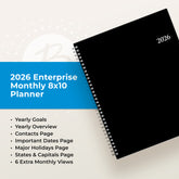 2026 planner black cover featuring overview of features like goals, contacts page, etc.