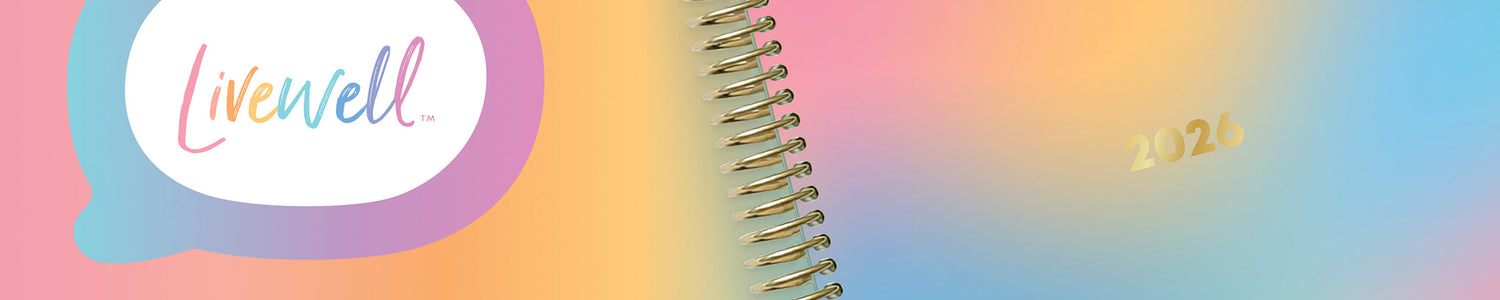 Colorful planner with 'Livewell' branding and the year 2023 on a gradient background.