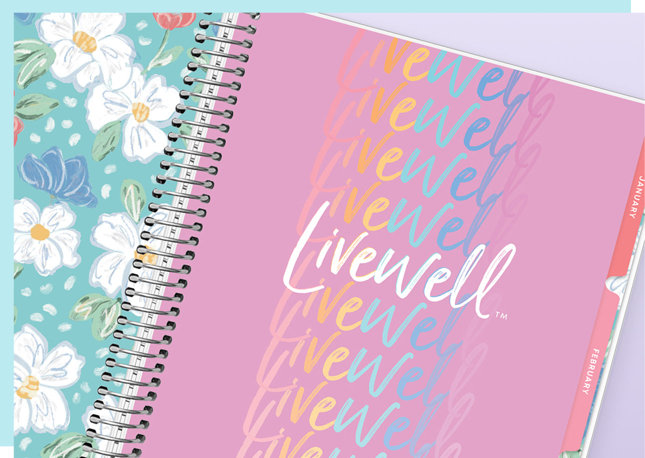 Spiral-bound notebook with floral design on left page and 'Livewell' branding on right page.