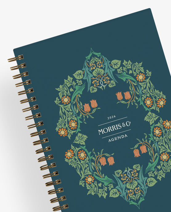 Green agenda with floral design and 'Morris & Co' branding on a white background