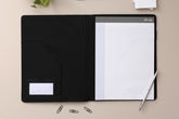 padfolio organizer in black by blue sky includes a 8.5x11 notepad with lined writing space, card holder, and storage pocket.