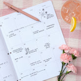 monthly open spread for this sincerely jules x blue sky planner featuring ample lined writing space