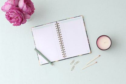 Day designer for blue sky floral notebook featuring ample lined writing space for important dates, notes, to-do lists, bullet points, and mint border.