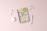 2023-2024 weekly monthly academic planner for the school year in mint background and floral patterns in 5x8 size, gold wire binding