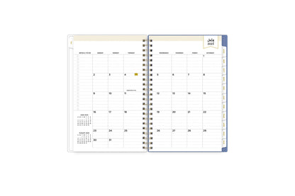 2023-2024 weekly monthly planner featuring a monthly spread with blue tabs for each month  and notes and to-do section