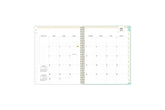 2023-2024 daily planner from day designer for blue sky featuring a monthly spread with lined writing space, to-do list, notes section, reference calendars and mint monthly tabs