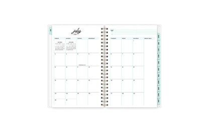 monthly spread featuring july 2023 with clean writing space for each day, mint monthly tabs