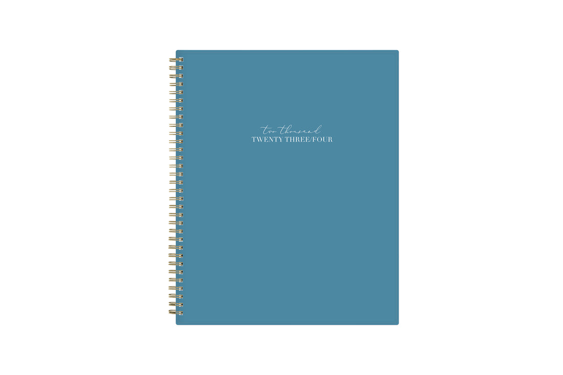 Solid oxford blue front cover with 2023 spelt out, gold twin wire o  binding in 8.5x11 planner size