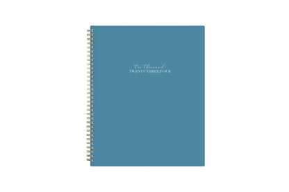 Solid oxford blue front cover with 2023 spelt out, gold twin wire o  binding in 8.5x11 planner size