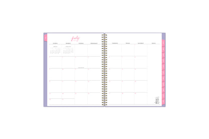 July 2023 - June 2024 dated monthly planner spread featuring blank writing space for each day, goals section, and pink monthly tabs