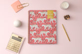 8.5x11 jungle cat cover with matte coral background dated 2023-2024